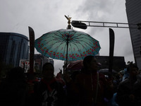 Mothers and fathers of the 43 missing Ayotzinapa students march from the Angel of Independence to the Zocalo in Mexico City, Mexico, on Sept...