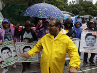 Mothers and fathers of the 43 missing Ayotzinapa students march from the Angel of Independence to the Zocalo in Mexico City, Mexico, on Sept...