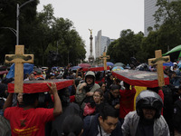 Mothers and fathers of the 43 missing Ayotzinapa students march from the Angel of Independence to the Zocalo in Mexico City, Mexico, on Sept...