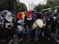 Normalista students accompany the mothers and fathers of the 43 missing Ayotzinapa students in Mexico City, Mexico, on September 26, 2024, a...