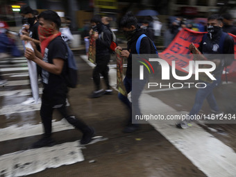 Normalista students accompany the mothers and fathers of the 43 missing Ayotzinapa students in Mexico City, Mexico, on September 26, 2024, a...