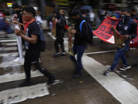 Normalista students accompany the mothers and fathers of the 43 missing Ayotzinapa students in Mexico City, Mexico, on September 26, 2024, a...