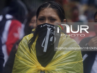 Normalista students accompany the mothers and fathers of the 43 missing Ayotzinapa students in Mexico City, Mexico, on September 26, 2024, a...