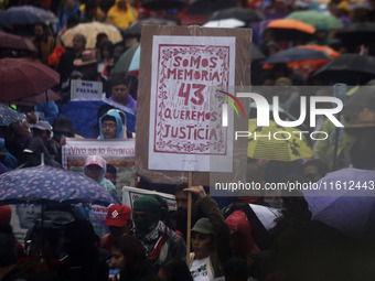 Mothers and fathers of the 43 missing Ayotzinapa students march from the Angel of Independence to the Zocalo in Mexico City, Mexico, on Sept...