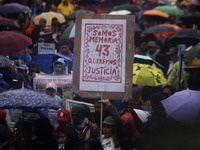 Mothers and fathers of the 43 missing Ayotzinapa students march from the Angel of Independence to the Zocalo in Mexico City, Mexico, on Sept...