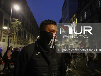 Normalista students accompany the mothers and fathers of the 43 missing Ayotzinapa students in Mexico City, Mexico, on September 26, 2024, a...