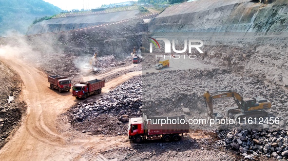 Workers work at the construction site of the Jiangjiakou Reservoir project in Jiangjiakou town, Bazhong, China, on September 25, 2024. 