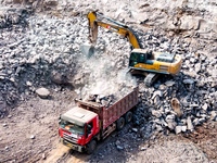 Workers work at the construction site of the Jiangjiakou Reservoir project in Jiangjiakou town, Bazhong, China, on September 25, 2024. (