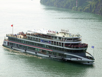 Tourists take a cruise to visit the Three Gorges of the Yangtze River on World Tourism Day in Yichang, China, on September 27, 2024. (