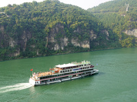 Tourists take a cruise to visit the Three Gorges of the Yangtze River on World Tourism Day in Yichang, China, on September 27, 2024. (