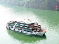 Tourists take a cruise to visit the Three Gorges of the Yangtze River on World Tourism Day in Yichang, China, on September 27, 2024. (