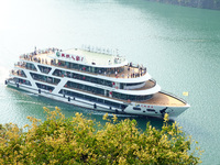 Tourists take a cruise to visit the Three Gorges of the Yangtze River on World Tourism Day in Yichang, China, on September 27, 2024. (