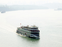 Tourists take a cruise to visit the Three Gorges of the Yangtze River on World Tourism Day in Yichang, China, on September 27, 2024. (