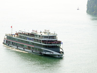 Tourists take a cruise to visit the Three Gorges of the Yangtze River on World Tourism Day in Yichang, China, on September 27, 2024. (