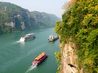 Tourists take a cruise to visit the Three Gorges of the Yangtze River on World Tourism Day in Yichang, China, on September 27, 2024. (