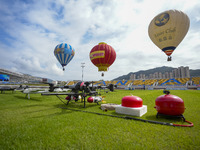 Hot air balloons and drones are displayed at the event of the China International Aircraft Design Challenge 2024 (Fujian Station) at the New...