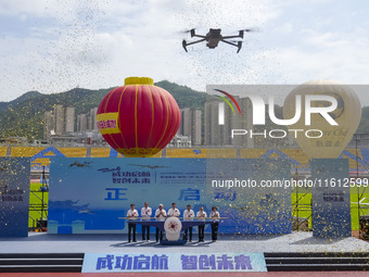 Guests participate in the launch ceremony of the China International Aircraft Design Challenge 2024 (Fujian Station) at the new Stadium in N...