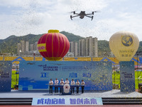 Guests participate in the launch ceremony of the China International Aircraft Design Challenge 2024 (Fujian Station) at the new Stadium in N...