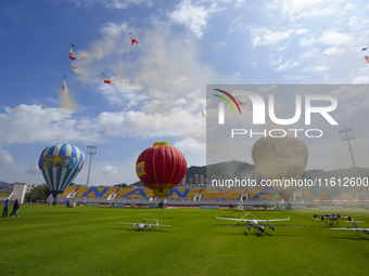 Drones perform at the event site of the China International Aircraft Design Challenge 2024 (Fujian Station) at the New Stadium in Nan'an, Fu...