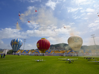 Drones perform at the event site of the China International Aircraft Design Challenge 2024 (Fujian Station) at the New Stadium in Nan'an, Fu...