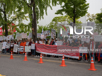 Around 100 members of the Korean Jumma Association gather near the Embassy of Bangladesh in Seoul, South Korea, on September 27, 2024, to pr...