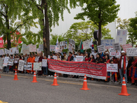 Around 100 members of the Korean Jumma Association gather near the Embassy of Bangladesh in Seoul, South Korea, on September 27, 2024, to pr...