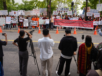 Around 100 members of the Korean Jumma Association gather near the Embassy of Bangladesh in Seoul, South Korea, on September 27, 2024, to pr...