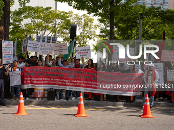 Around 100 members of the Korean Jumma Association gather near the Embassy of Bangladesh in Seoul, South Korea, on September 27, 2024, to pr...