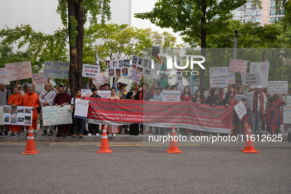 Around 100 members of the Korean Jumma Association gather near the Embassy of Bangladesh in Seoul, South Korea, on September 27, 2024, to pr...