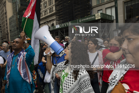 A pro-Palestinian person chants during a protest in Bryant Park, New York City, USA, on September 26, 2024. Hundreds gather for demonstratio...