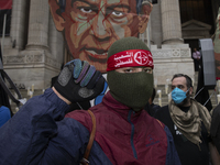 A pro-Palestinian demonstrator poses for photographs during a protest in Bryant Park, New York City, USA, on September 26, 2024. Hundreds ga...