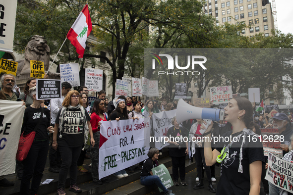 A pro-Palestinian person chants during a protest in Bryant Park, New York City, USA, on September 26, 2024. Hundreds gather for demonstratio...