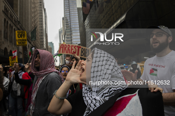 A pro-Palestinian person chants during a protest in New York City, USA, on September 26, 2024. Hundreds gather for demonstrations against Is...