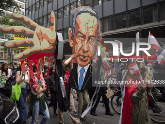 Hundreds gather for a pro-Palestinian protest in New York City, USA, on September 26, 2024, demonstrating against Israeli Prime Minister Ben...