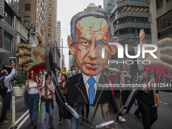 Hundreds gather for a pro-Palestinian protest in New York City, USA, on September 26, 2024, demonstrating against Israeli Prime Minister Ben...