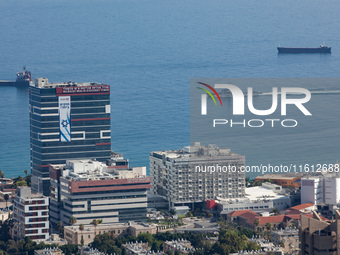 An Israeli naval vessel sails in the Mediterranean Sea just off the coast of Haifa, Israel, on September 27, 2024, following a rocket attack...