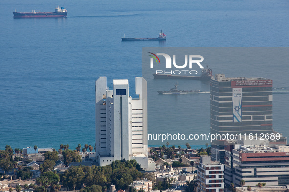 An Israeli naval vessel sails in the Mediterranean Sea just off the coast of Haifa, Israel, on September 27, 2024, following a rocket attack...