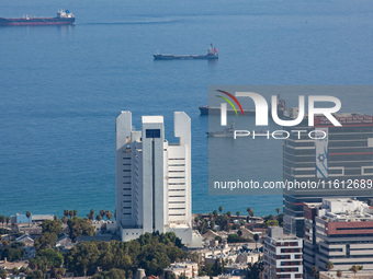 An Israeli naval vessel sails in the Mediterranean Sea just off the coast of Haifa, Israel, on September 27, 2024, following a rocket attack...