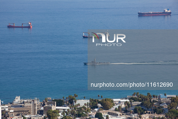 An Israeli naval vessel sails in the Mediterranean Sea just off the coast of Haifa, Israel, on September 27, 2024, following a rocket attack...