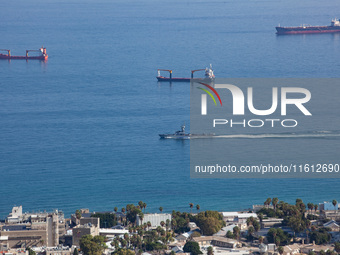 An Israeli naval vessel sails in the Mediterranean Sea just off the coast of Haifa, Israel, on September 27, 2024, following a rocket attack...