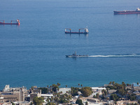 An Israeli naval vessel sails in the Mediterranean Sea just off the coast of Haifa, Israel, on September 27, 2024, following a rocket attack...