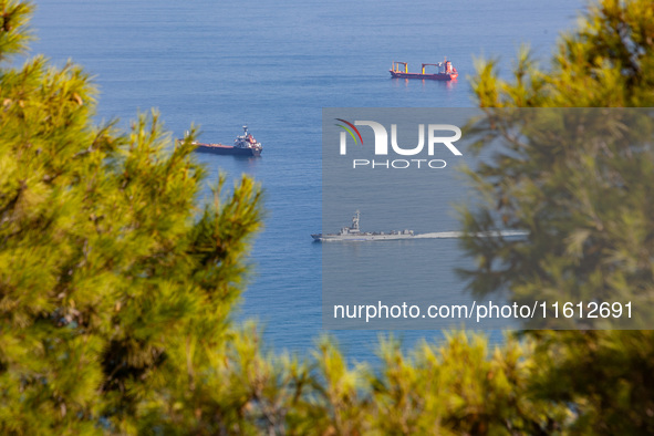 An Israeli naval vessel sails in the Mediterranean Sea just off the coast of Haifa, Israel, on September 27, 2024, following a rocket attack...