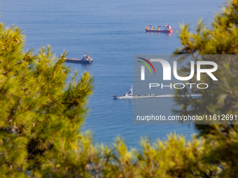 An Israeli naval vessel sails in the Mediterranean Sea just off the coast of Haifa, Israel, on September 27, 2024, following a rocket attack...