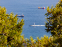 An Israeli naval vessel sails in the Mediterranean Sea just off the coast of Haifa, Israel, on September 27, 2024, following a rocket attack...