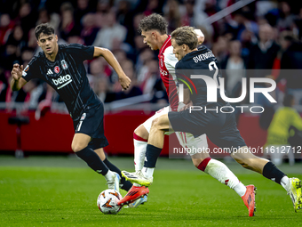 AFC Ajax Amsterdam forward Mika Godts and Besiktas JK defender Jonas Svensson during the match between Ajax and Besiktas at the Johan Cruijf...