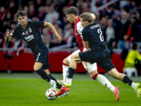 AFC Ajax Amsterdam forward Mika Godts and Besiktas JK defender Jonas Svensson during the match between Ajax and Besiktas at the Johan Cruijf...