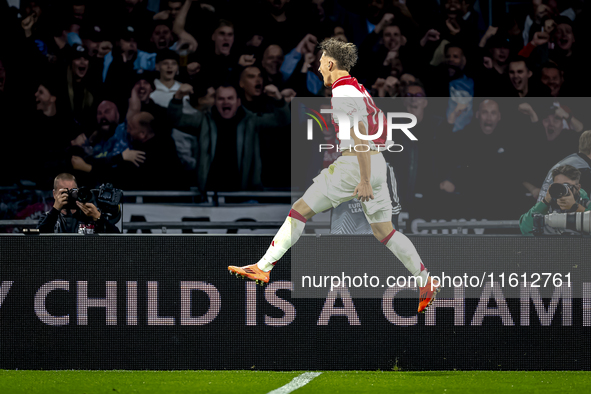 AFC Ajax Amsterdam forward Mika Godts scores the 2-0 goal and celebrates during the match between Ajax and Besiktas at the Johan Cruijff Are...