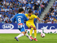 Leandro Cabrera of Espanyol challenges Sergi Cardona of Villarreal for the ball during the La Liga EA SPORTS match at Stage Front Stadium, i...