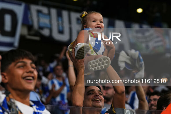 Espanyol fans cheer for their team during the La Liga EA SPORTS match against Villarreal at Stage Front Stadium, on September 26, 2024 