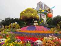 National Day themed flower beds are displayed along Chang'an Avenue in Beijing, China, on September 27, 2024. (